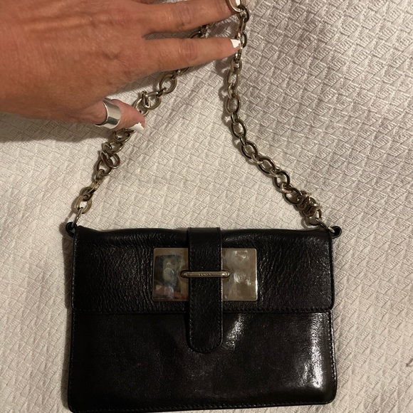 Furla Handbags - There is no discoloration on the gold. It’s just the shadow from the camera!?